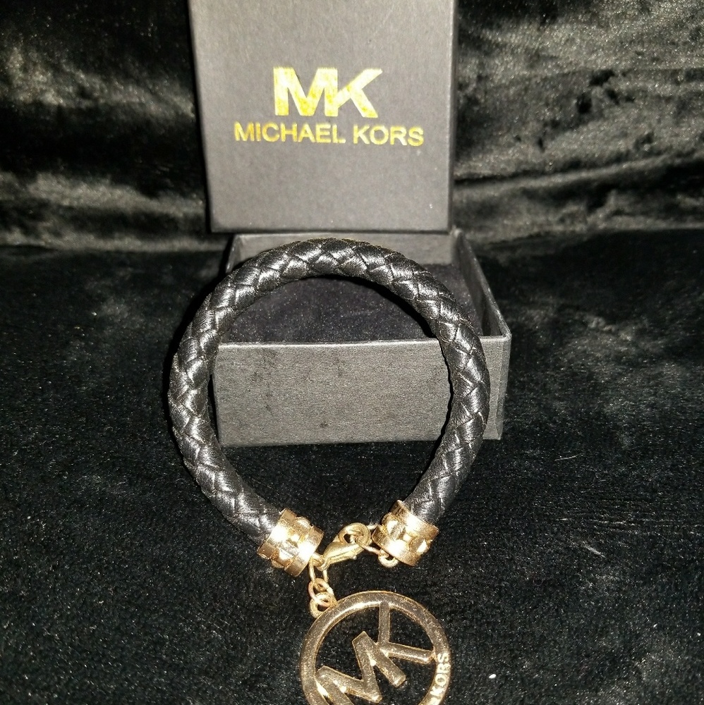 MK black braided bracelet with charm